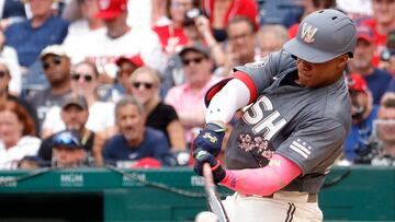 Jul 16, 2022; Washington, District of Columbia, USA; Washington Nationals right fielder Juan Soto (22) hits a single against the Atlanta Braves during the sixth inning at Nationals Park. Mandatory Credit: Geoff Burke-USA TODAY Sports