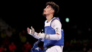 CHIBA, JAPAN - JULY 24: Lucas Lautaro Guzman of Team Argentina celebrates after defeating Armin Hadipour Seighalani of Team Iran during the Men's -58kg Taekwondo Quarterfinal contest on day one of the Tokyo 2020 Olympic Games at Makuhari Messe Hall on July 24, 2021 in Chiba, Japan. (Photo by Maja Hitij/Getty Images)