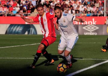 Karim Benzema and Girona's Marc Muniesa at the Montilivi