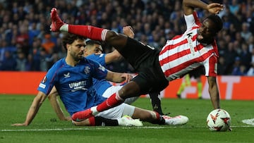 Rangers' Dutch defender #04 Robin Propper fouls Athletic Bilbao's Spanish striker #09 Inaki Williams and receives a red card for the challenge during the UEFA Europa League quarter final football match between Rangers and Athletic Club Bilbao at the Ibrox Stadium in Glasgow on April 10, 2025. (Photo by Ewan Bootman / AFP)