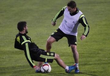 Koke e Isco.