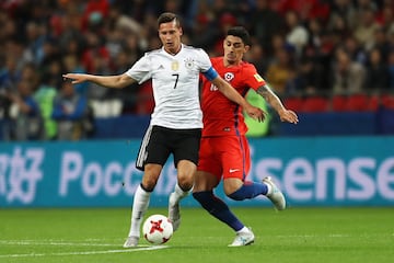 KAZAN, RUSSIA - JUNE 22:  Pablo Hernandz of Chile  tackles Julian Draxler of Germany during the FIFA Confederations Cup Russia 2017 Group B match between Germany and Chile at Kazan Arena on June 22, 2017 in Kazan, Russia.  (Photo by Francois Nel/Bongarts/Getty Images)