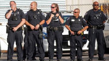 Members of the Rochester Police Department gather before the start of protests over the death of a Black man, Daniel Prude, after police put a spit hood over his head during an arrest on March 23, in Rochester, New York, U.S. September 4, 2020. REUTERS/Br