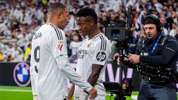 Kylian Mbappe of Real Madrid CF (L) celebrates his goal with Vinicius Junior of Real Madrid CF (R) during the La Liga EA Sports 2024/25 football match between Real Madrid CF and FC Barcelona at Estadio Santiago Bernabeu in Madrid, Spain, on October 26, 2024. (Photo by Alberto Gardin/NurPhoto via Getty Images)