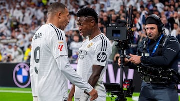 Kylian Mbappe of Real Madrid CF (L) celebrates his goal with Vinicius Junior of Real Madrid CF (R) during the La Liga EA Sports 2024/25 football match between Real Madrid CF and FC Barcelona at Estadio Santiago Bernabeu in Madrid, Spain, on October 26, 2024. (Photo by Alberto Gardin/NurPhoto via Getty Images)
