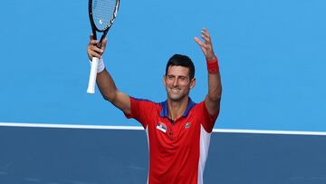 TOKYO, JAPAN - JULY 24: Novak Djokovic of Team Serbia celebrates victory after his Men&#039;s Singles First Round match against Hugo Dellien of Team Bolivia on day one of the Tokyo 2020 Olympic Games at Ariake Tennis Park on July 24, 2021 in Tokyo, Japan. (Photo by Clive Brunskill/Getty Images)