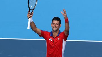 TOKYO, JAPAN - JULY 24: Novak Djokovic of Team Serbia celebrates victory after his Men's Singles First Round match against Hugo Dellien of Team Bolivia on day one of the Tokyo 2020 Olympic Games at Ariake Tennis Park on July 24, 2021 in Tokyo, Japan. (Photo by Clive Brunskill/Getty Images)