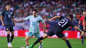 Jordan Carrillo (L) of Mexico fights for the ball with Jose Segredo (R) of Bolivia during the game international friendly between Mexican National team (Mexico) Bolivia at Soldier Field Stadium on May 31, 2024 in Chicago, Illinois, United States.