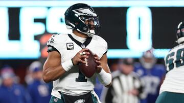 EAST RUTHERFORD, NEW JERSEY - JANUARY 07: Jalen Hurts #1 of the Philadelphia Eagles looks to throw a pass during the first half in the game against the New York Giants at MetLife Stadium on January 07, 2024 in East Rutherford, New Jersey.   Elsa/Getty Images/AFP (Photo by ELSA / GETTY IMAGES NORTH AMERICA / Getty Images via AFP)