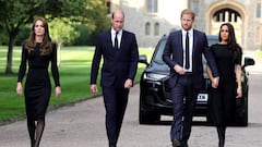 WINDSOR, ENGLAND - SEPTEMBER 10: Catherine, Princess of Wales, Prince William, Prince of Wales, Prince Harry, Duke of Sussex, and Meghan, Duchess of Sussex on the long Walk at Windsor Castle arrive to view flowers and tributes to HM Queen Elizabeth on September 10, 2022 in Windsor, England. Crowds have gathered and tributes left at the gates of Windsor Castle to Queen Elizabeth II, who died at Balmoral Castle on 8 September, 2022. (Photo by Chris Jackson/Getty Images)