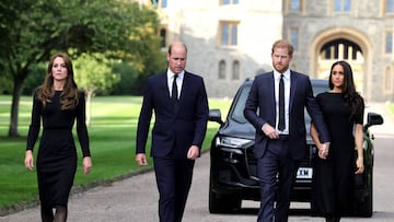 WINDSOR, ENGLAND - SEPTEMBER 10: Catherine, Princess of Wales, Prince William, Prince of Wales, Prince Harry, Duke of Sussex, and Meghan, Duchess of Sussex on the long Walk at Windsor Castle arrive to view flowers and tributes to HM Queen Elizabeth on September 10, 2022 in Windsor, England. Crowds have gathered and tributes left at the gates of Windsor Castle to Queen Elizabeth II, who died at Balmoral Castle on 8 September, 2022. (Photo by Chris Jackson/Getty Images)