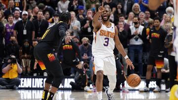 Jan 26, 2022; Salt Lake City, Utah, USA; Phoenix Suns guard Chris Paul (3) brings the ball up the court while guarded by Utah Jazz guard Mike Conley (11) during the fourth quarter at Vivint Arena. Phoenix Suns won 105-97. Mandatory Credit: Chris Nicoll-USA TODAY Sports