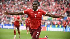 Switzerland's forward #07 Breel Embolo celebrates scoring his team's third goal during the UEFA Euro 2024 Group A football match between Hungary and Switzerland at the Cologne Stadium in Cologne on June 15, 2024. (Photo by Angelos Tzortzinis / AFP)