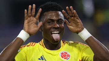 Colombia's midfielder #23 Neiser Villarreal celebrates after scoring a goal during the 2025 South American U-20 football championship final round match between Colombia and Paraguay at the Br�gido Iriarte stadium in Caracas on February 4, 2025. (Photo by Edixon GAMEZ / AFP)