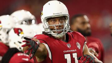 GLENDALE, AZ - AUGUST 30: Wide receiver Larry Fitzgerald #11 of the Arizona Cardinals throws a pass during warm ups to the preseason NFL game against the Denver Broncos at University of Phoenix Stadium on August 30, 2018 in Glendale, Arizona.   Christian Petersen/Getty Images/AFP
 == FOR NEWSPAPERS, INTERNET, TELCOS &amp; TELEVISION USE ONLY ==