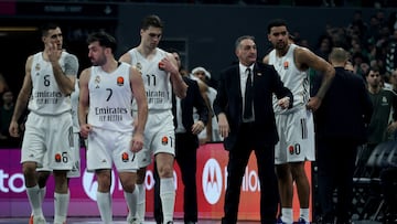Real Madrid's coach Sergio Scariolo (2-R) and players look disappointed after losing the EuroLeague Basketball match between Panathinaikos Athens and Real Madrid, in Athens, Greece, 03 February 2026.