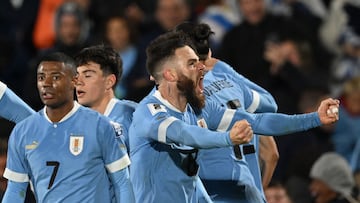 Uruguay's midfielder Nahitan Nandez (C) celebrates a goal scored by teammate forward Darwin Nunez during the 2026 FIFA World Cup South American qualification football match between Uruguay and Colombia at the Centenario Stadium in Montevideo on October 17, 2023. (Photo by Eitan ABRAMOVICH / AFP)