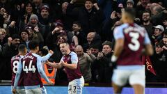 Aston Villa's Scottish midfielder #07 John McGinn (2nd R) celebrates with teammates after scoring his team first goal during the English Premier League football match between Aston Villa and Arsenal at Villa Park in Birmingham, central England on December 9, 2023. (Photo by JUSTIN TALLIS / AFP) / RESTRICTED TO EDITORIAL USE. No use with unauthorized audio, video, data, fixture lists, club/league logos or 'live' services. Online in-match use limited to 120 images. An additional 40 images may be used in extra time. No video emulation. Social media in-match use limited to 120 images. An additional 40 images may be used in extra time. No use in betting publications, games or single club/league/player publications. / 