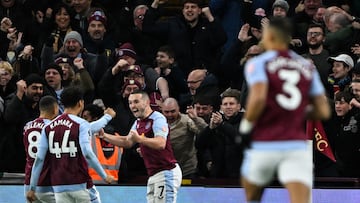 Aston Villa's Scottish midfielder #07 John McGinn (2nd R) celebrates with teammates after scoring his team first goal during the English Premier League football match between Aston Villa and Arsenal at Villa Park in Birmingham, central England on December 9, 2023. (Photo by JUSTIN TALLIS / AFP) / RESTRICTED TO EDITORIAL USE. No use with unauthorized audio, video, data, fixture lists, club/league logos or 'live' services. Online in-match use limited to 120 images. An additional 40 images may be used in extra time. No video emulation. Social media in-match use limited to 120 images. An additional 40 images may be used in extra time. No use in betting publications, games or single club/league/player publications. / 