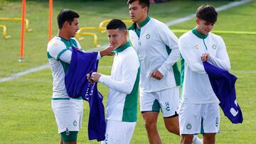 LEON, MEXICO - JANUARY 14: James Rodriguez (2L) of Leon looks on during a training presentation as a new player of Club Leon at Leon Stadium on January 14, 2025 in Leon, Mexico. (Photo by Leopoldo Smith/Getty Images)