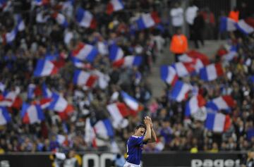 Franck Ribery applauds fans as he leaves the field after being substituted during a friendly against Colombia at Stade de France in June 2008.