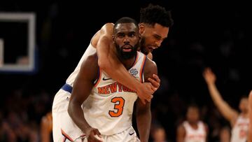 NEW YORK, NY - NOVEMBER 15: Tim Hardaway Jr. #3 of the New York Knicks is congratulated by teammate Courtney Lee #5 after Hardaway Jr. hit a three point shot in the final minutes of the game against the Utah Jazz at Madison Square Garden on November 15, 2017 in New York City. NOTE TO USER: User expressly acknowledges and agrees that, by downloading and or using this Photograph, user is consenting to the terms and conditions of the Getty Images License Agreement Elsa/Getty Images/AFP
== FOR NEWSPAPERS, INTERNET, TELCOS & TELEVISION USE ONLY ==