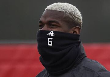 Manchester United's French midfielder Paul Pogba attends during a training session at their Carrington base in Manchester