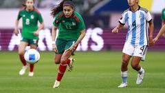  Lizbeth Ovalle (L) of Mexico fights for the ball with Julieta Cruz (R) of Argentina  during the Group stage, Group A match between Mexico (Mexico National team) and Argentina as part of the Concacaf Womens Gold Cup 2024, at Dignity Health Sports Park Stadium on February 20, 2024 in Carson California, United States.