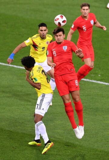 Harry Maguire y Juan Cuadrado.