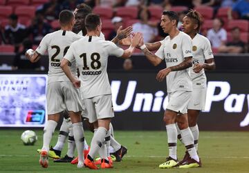 Nkunku celebrates with his team mates