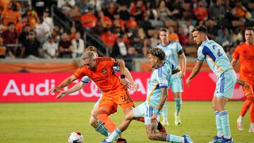 Oct 7, 2023; Houston, Texas, USA; Houston Dynamo midfielder Hector Herrera (16) and Colorado Rapids forward Rafael Navarro (9) work the ball during the first half at Shell Energy Stadium. Mandatory Credit: Dustin Safranek-USA TODAY Sports