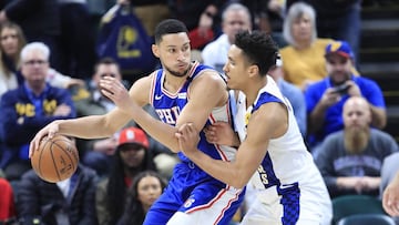 INDIANAPOLIS, INDIANA - JANUARY 13: Ben Simmons #25 of the Philadelphia 76ers dribbles the ball while defended by Malcolm Brogdon #7 of the Indiana Pacers at Bankers Life Fieldhouse on January 13, 2020 in Indianapolis, Indiana. NOTE TO USER: User expressly acknowledges and agrees that, by downloading and or using this photograph, User is consenting to the terms and conditions of the Getty Images License Agreement. Andy Lyons/Getty Images/AFP
== FOR NEWSPAPERS, INTERNET, TELCOS & TELEVISION USE ONLY ==