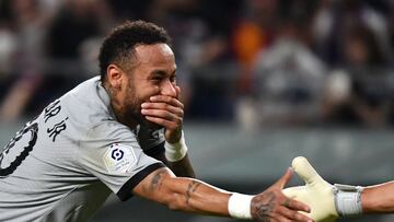 Paris Saint-Germain's Brazilian forward Neymar shakes hands with Gamba Osaka's Japanese goalkeeper Masaaki Higashiguchi.