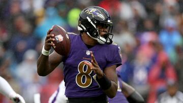 BALTIMORE, MARYLAND - OCTOBER 02: Quarterback Lamar Jackson #8 of the Baltimore Ravens fakes a handoff against the Buffalo Bills at M&T Bank Stadium on October 02, 2022 in Baltimore, Maryland. Rob Carr/Getty Images/AFP