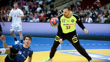 19 January 2023, Poland, Kattowitz: Handball: World Cup, Germany - Argentina, Main Round, Group 3, Matchday 1 at Spodek Katowice. Germany's goalkeeper Andreas Wolff (r) cheers after making a save and looks at Argentina's Diego Simonet. Photo: Jan Woitas/dpa (Photo by Jan Woitas/picture alliance via Getty Images)