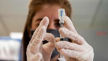 Home base primary care Pharmacist Erin Emonds logs onto a computer before filling syringes the Johnson &amp; Johnson Janssen vaccine at the US Department of Veterans Affairs&#039; VA Boston Healthcare System&#039;s Jamaica Plain Medical Center in Boston, 