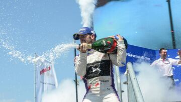 Sam Bird from the DS Virgin Racing team sprays champagne after winning the inaugural New York ePrix Formula E World Championship in the Brooklyn borough of New York City, U.S., July 16, 2017. REUTERS/Stephanie Keith