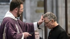 Canon Matthew Pollard makes an ash cross on the forehead of the Very Reverend John Dobson, during the imposition of the ashes during the Ash Wednesday Eucharist at Ripon Cathedral in North Yorkshire.