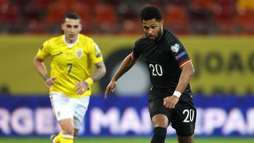 BUCHAREST, ROMANIA - MARCH 28: Serge Gnabry of Germany runs with the ball during the FIFA World Cup 2022 Qatar qualifying match between Romania and Germany at the National Arena on March 28, 2021 in Bucharest, Romania. Sporting stadiums around Romania rem