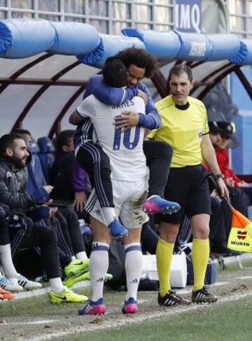 James Rodríguez celebrates with Marcelo.