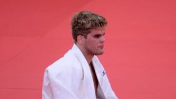 United States' Nicholas Delpopolo reacts after losing against Mongolia's Nyam-Ochir Sainjargal during their men's -73kg judo contest repechage match of the London 2012 Olympic Games on July 30, 2012 at the ExCel arena in London. AFP PHOTO / FRANCK FIFE