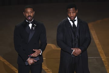 Jonathan Majors and Michael B. Jordan present the Oscar for Best Cinematography during the Oscars show at the 95th Academy Awards in Hollywood, Los Angeles, California, U.S., March 12, 2023. REUTERS/Carlos Barria