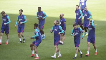 Los jugadores del Barça, en el entrenamiento de este viernes.