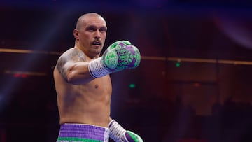 Boxing - Oleksandr Usyk v Tyson Fury - Heavyweight World Title - Kingdom Arena, Riyadh, Saudi Arabia - December 22, 2024 Oleksandr Usyk reacts during his fight against Tyson Fury Action Images via Reuters/Andrew Couldridge