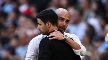 FILE PHOTO: Soccer Football - Community Shield - Manchester City v Arsenal - Wembley Stadium, London, Britain - August 6, 2023  Manchester City manager Pep Guardiola with Arsenal manager Mikel Arteta at full time REUTERS/Dylan Martinez/File Photo