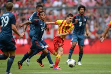 Leo Messi y Thiago Alcántara.