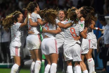 The young Spaniards celebrate after their World Cup semi-final win over France.