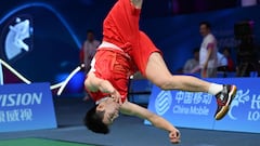 China�s Li Shifeng does a flip as he celebrates his victory against compatriot Shi Yuqi in their men�s badminton singles final match during the Hangzhou 2022 Asian Games in Hangzhou, in China�s Zhejiang province on October 7, 2023. (Photo by ADEK BERRY / AFP)