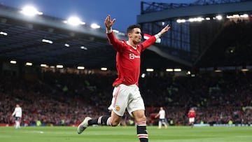 MANCHESTER, ENGLAND - MARCH 12: Cristiano Ronaldo of Manchester United celebrates after scoring their side's second goal during the Premier League match between Manchester United and Tottenham Hotspur at Old Trafford on March 12, 2022 in Manchester,
