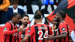Nice's Nigerian forward #09 Terem Moffi (R) celebrates with teammates after scoring his team's first goal during the French L1 football match between OGC Nice and Toulouse FC at the Allianz Riviera Stadium in Nice, south-eastern France, on November 26, 2023. (Photo by Valery HACHE / AFP)